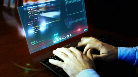 Man typing on keyboard with program code on virtual hologram screen Stock Footage 127627459