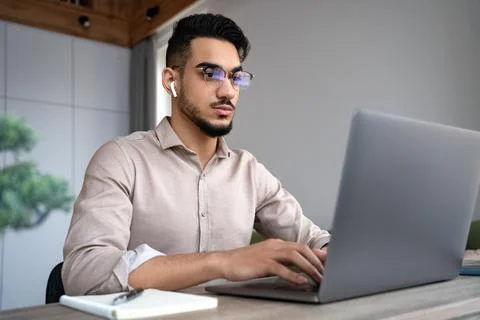 Man typing on keyboard using computer and internet for job or communication Stock Photos