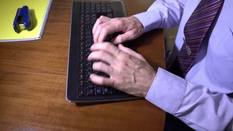 Man typing on the keybpard in the office 4K Stock Footage 93110093