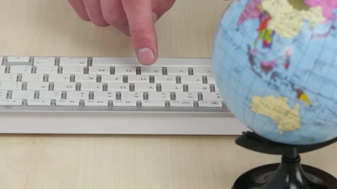 A man typing on a keypad Stock Footage 237498970