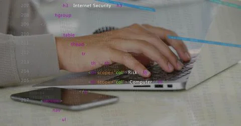 Man typing on laptop and generating security overlays with HTML tags, analyzing Foto stock