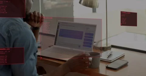 Man typing on laptop and selecting chat bubble, causing red HUD panels updating Stock Footage 332468088