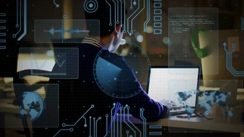 Man typing on laptop and tapping phone, causing HUD radar rotating and code Video stock 335316855