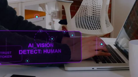 Man typing on laptop, AR HUD detecting presence and activating security notes on Stock Footage 335211574