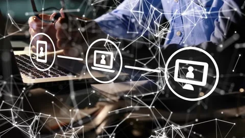 Man typing on laptop, causing animated network overlay growing over tech desk, Stock Footage 335282011