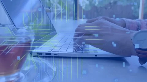 Man typing laptop causing neon circuits, green code scrolling, briefly obscuring Video stock 334743898