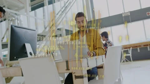 Man typing laptop causing tech overlay appearing obscuring desk while monitoring Stock Footage 333255627
