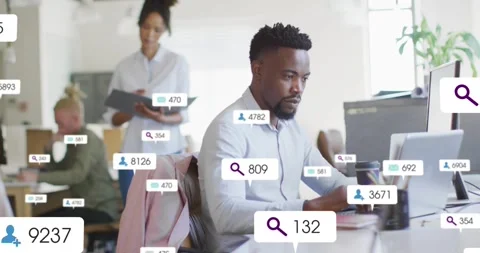 Man typing laptop causing UI alerts growing across tech while woman approaching Stock Footage 334040347