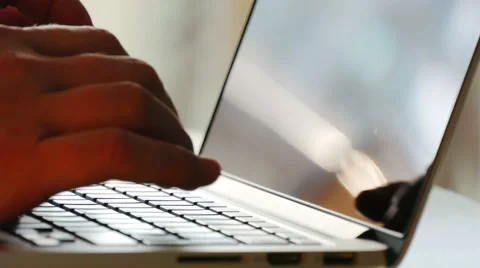 Man typing on a laptop, close up Video stock 50223046