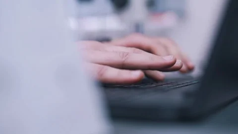 Man typing on a laptop close up Stock Footage 112152867