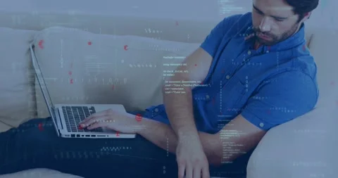 Man typing on laptop code overlay appearing tapping tablet calling phone while Stock Footage 329121990