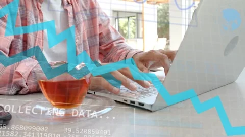 Man typing at laptop, 'COLLECTING DATA Stock Footage 334465886