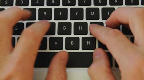 A man typing on a laptop computer closeup Video stock 54803110