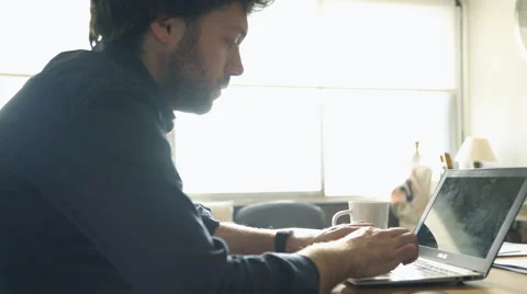 Man typing on laptop computer Stock Footage 63283445
