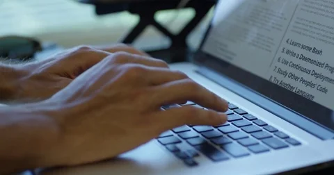Man Typing on Laptop Computer 動画素材 79437991