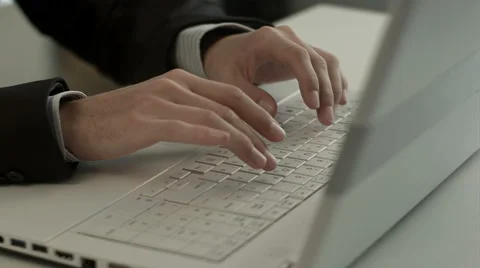 Man typing on laptop computer keyboard Stock Footage 51209290