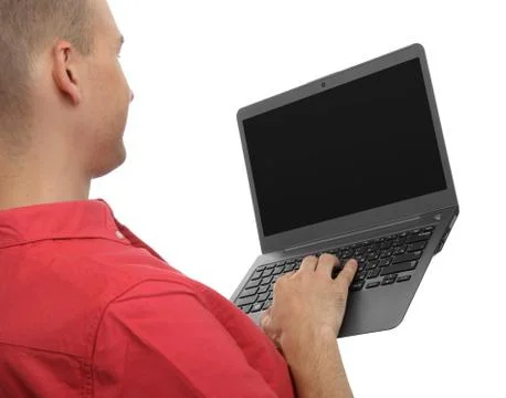 Man typing on laptop computer Stock Photos
