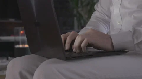 Man typing on a laptop Stock Footage 68480970