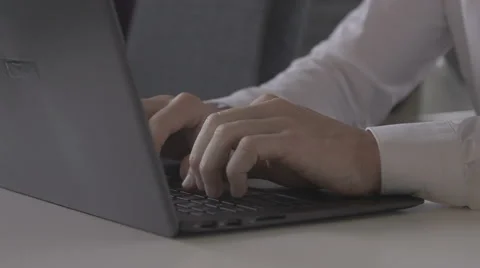 Man typing on a laptop Stock Footage 68481106