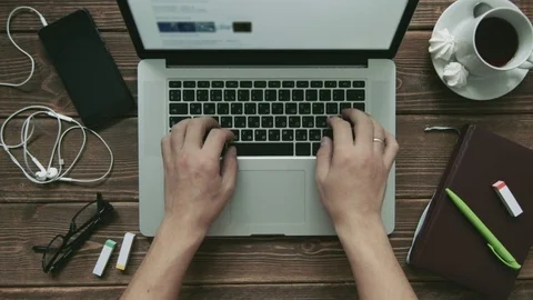 Man typing on laptop Stock Footage 69801722