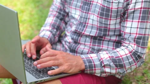 Man typing on laptop Stock Footage 264035381