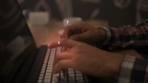 Man typing on laptop keyboard, augmented reality, hologram letters. HUD graphics Stock Footage 117068313