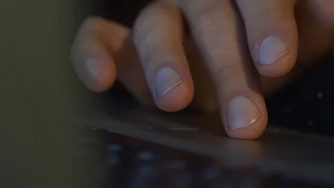 The man is typing on the laptop keyboard. close-up Stock Footage 80279121