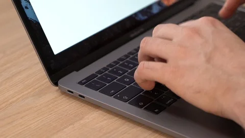 Man Typing On Laptop Keyboard, Close-up Stock Footage