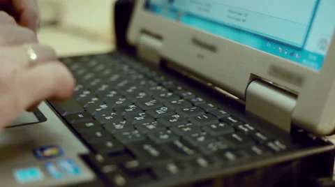 Man typing on laptop keyboard Stock Footage 58011641