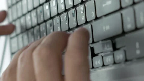 A man is typing on a laptop keyboard Stock Footage 91181005
