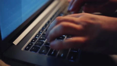 Man typing on laptop keyboard 스톡 동영상 163375980