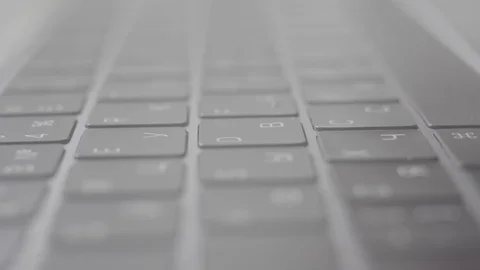 Man typing on a laptop keyboard, freelancer working, copywriter, macro Video stock 107071389