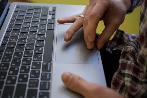 Man typing on laptop keyboard, work and business concept Stock Photos