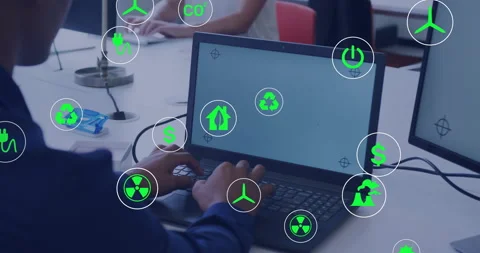 Man typing laptop keys and making green energy icons float around screen for Stock Footage 311603636