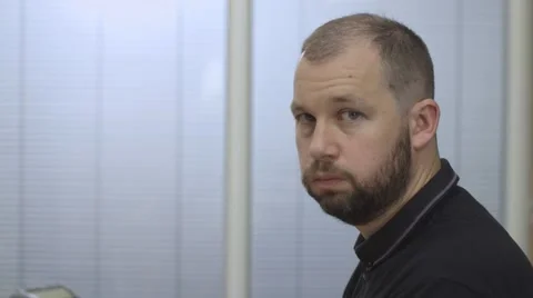 Man typing at laptop looking stressed or disappointed Stock Footage 68614723