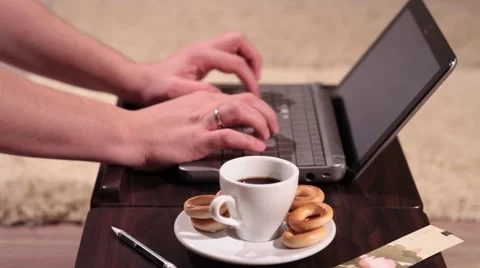 A man is typing on laptop - side view Stock Footage 58395375