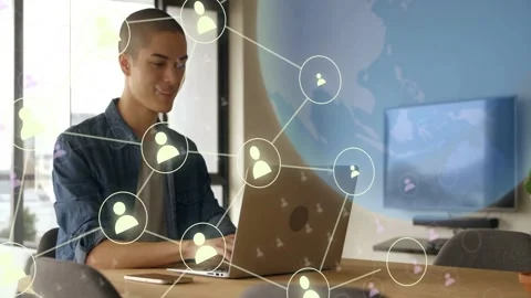 Man typing on laptop, starting nodes and globe around him while network Stock Footage 333509895