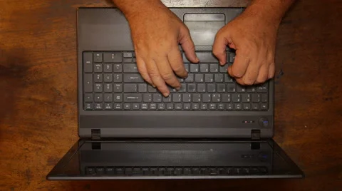 Man typing in laptop - top view Stock Footage 57946093