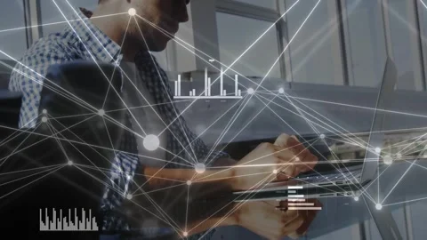 Man typing on laptop while moving network nodes fading in overlaying keys and Stock Footage 334703516