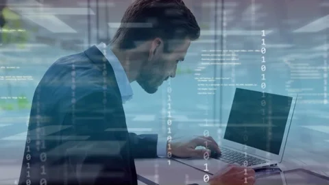Man typing on laptop by window, causing soft binary overlay aligning with screen Stock Footage 334703562