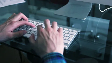 Man typing in a Mac Apple keyboard. Stock Footage 39992965