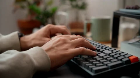 Man Typing on A Mechanical Keyboard at Home Office Stock Footage 217957507