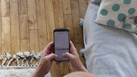 Man typing a message on the phone. Stock Footage 254915912