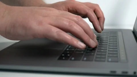 Man typing on modern notebook / laptop computer keyboard Stock Footage 95551690