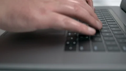 Man typing on modern notebook / laptop computer keyboard Stock Footage 95552245