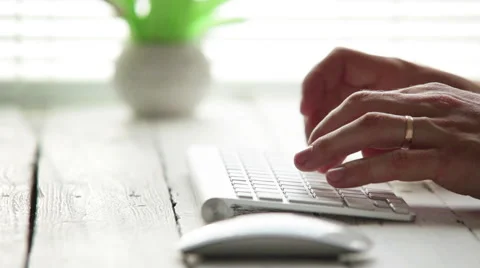 Man is typing on the modern wireless keyboard Stock-Footage 57672888