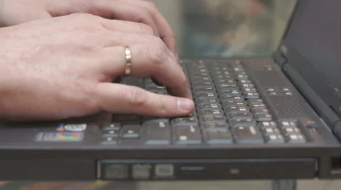 Man typing on old laptop Stock Footage 46817101