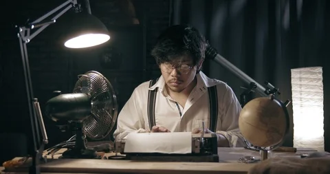 Man Typing on Old Typewriter 1950s Scene Setup. Slow Motion Front Shot 4K Stock Footage 114291885