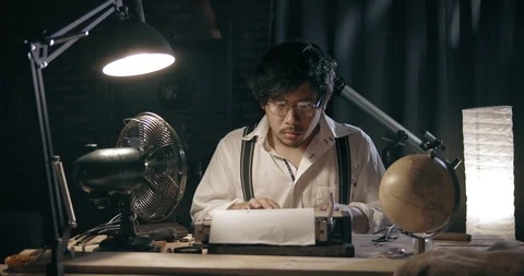 Man Typing on Old Typewriter 1950s Scene Setup. Front Shot 4K Stock Footage 114292172