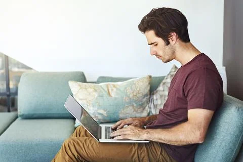 Man, typing or sofa with laptop in home for remote work, online research or.. Stock Photos